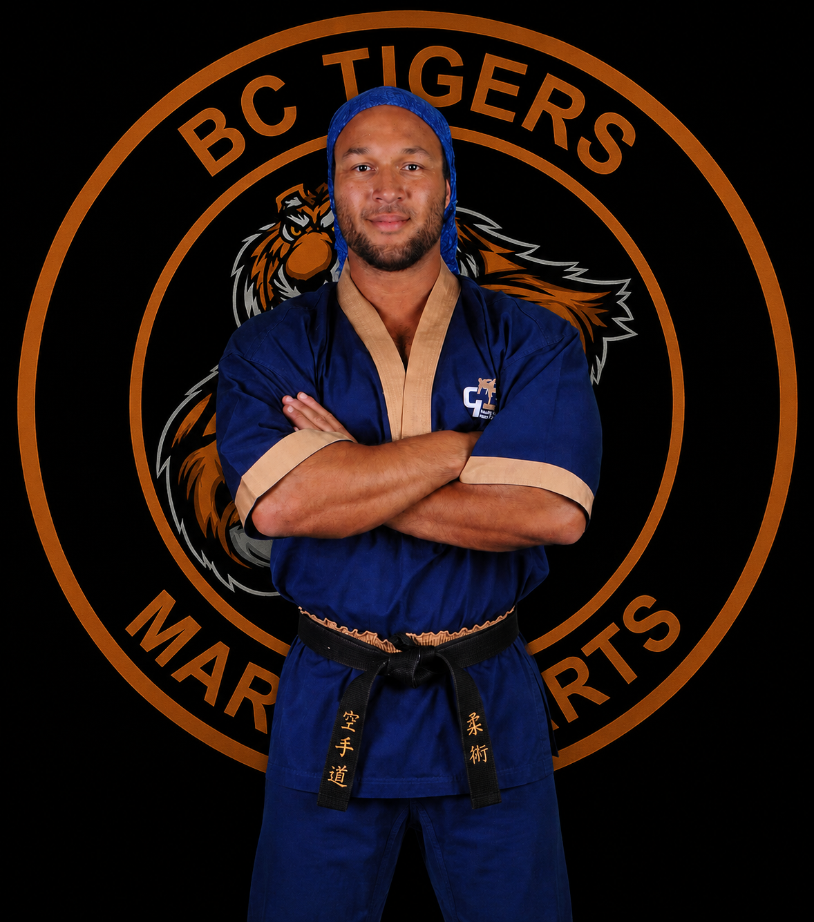 Sensei Liam, BC Tigers Martial Arts kickboxing coach, in his navy gi